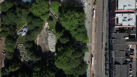 Aerial-drone-flight-giving-a-birdseye-view-over-All-Saints-Park-and-Oxford-Road-in-Manchester-City-Centre