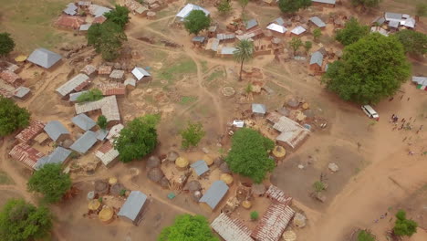 Rural-farming-village-in-Nigeria,-West-Africa---aerial-reveal