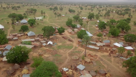 Rural-traditional-farming-village-in-Nigeria,-West-Africa---aerial-parallax