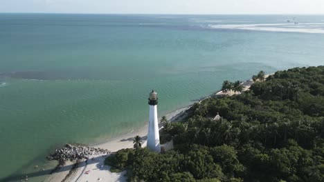drone-rotate-around-Cape-Florida-Llighthouse-south-end-of-Key-Biscayne-in-Miami-Dade-County,-Florida-USA