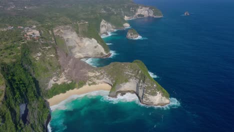 The-aerial-view-unveils-the-intricate-details-of-the-coastline,-Discover-Diamond-Beach-With-its-ivory-sands,-crystalline-waters,-iconic-rock-formations,-and-true-tropical-paradise