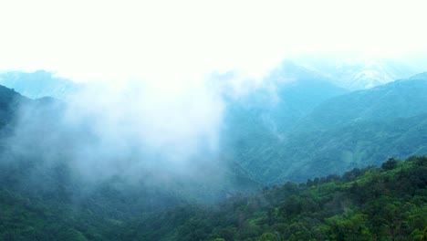 Aerial-rising-shot-of-low-lying-clouds-in-the-Meghalaya-rainforest-region