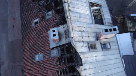Drone-shot-of-burned-house-from-bird-eye-view-in-Tartu