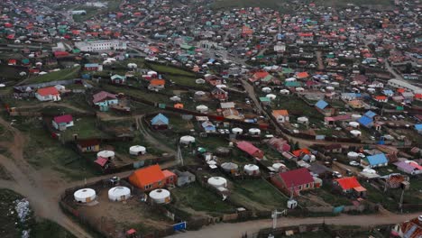 Flying-Over-Detached-Houses-And-Tents-In-Green-Areas-Of-Ulaanbaatar,-Mongolia