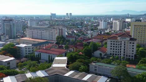 Aerial-establishing-shot-of-downtown-communities-within-Hue,-Vietnam