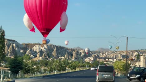 Rise-above-Turkey's-stunning-scenery-with-hot-air-balloons,-painting-the-skies-with-vivid-colors
