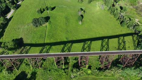 An-aerial-view-of-the-Moodna-Viaduct,-steel-railroad-trestle-in-Cornwall,-New-York