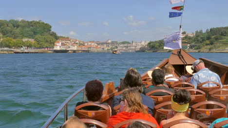 Pan-shot-of-tourists-on-Boat-tour-on-the-Douro