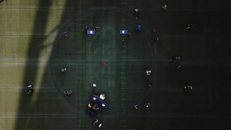 4K-Top-Down-Kids-Playing-Summer-Grass-Turf-Drone-Shot-of-IG-Investors-Group-Field-University-of-Manitoba-Winnipeg-Blue-Bombers-Football-and-Soccer-Concert-Stadium-Arena-in-Canada