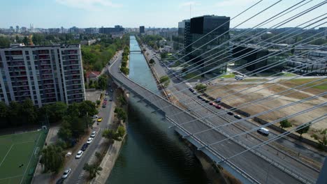 Aerial-View-Of-Ciurel-Bridge-In-Bucharest,-Romania-On-A-Sunny-Day-With-A-Blue-Sky