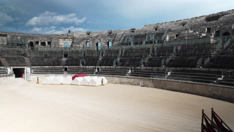 POV-shot-reveals-grandeur-of-Nimes-Arena,-its-ancient-beauty-bathed-in-sunlight