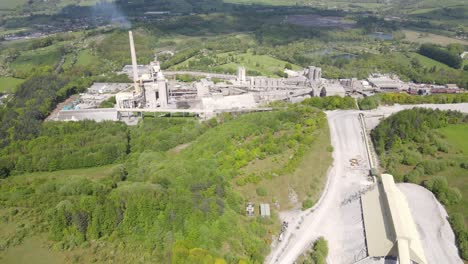 Aerial-drone-flight-with-a-view-of-Breedon-Hope-Cement-Works-in-Derbyshire-Peak-District