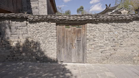 Yunnan-Ethnic-Minority-People-Walking-in-Village-in-Eryuan-County,-China