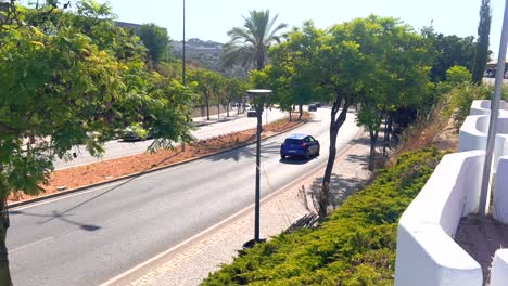 Dual-Carriageway-With-Cars-Passing-By-In-Albufeira-Portugal