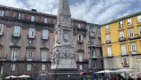 Tilt-up-view-of-the-monument-in-one-of-the-neighbourhood-areas-in-Naples,-Italy