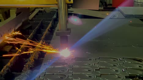 High-precision-laser-cutting-metal-plate-with-bright-sparkle
