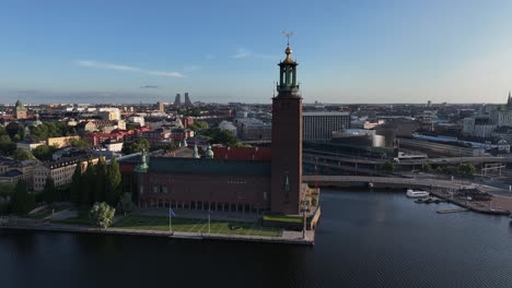 Tall-tower-of-historic-city-hall-in-Stockholm,-tourist-attraction-and-government-office-building
