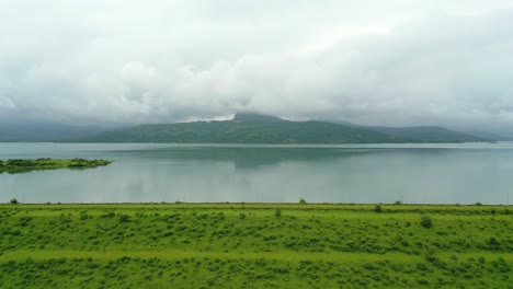 beautiful-pawna-dam-view-in-rainy-season-drone-moving-bottom-to-top-view