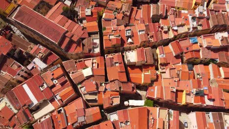 Top-down-background-of-colorful-Italian-south-European-town-roof,-Bosa,-Sardinia