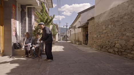 Ethnic-Minority-People-Smoking-in-Village-in-Yunnan,-China