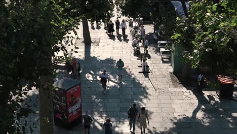 People-walking-past-the-Southbank-Centre,-London,-United-Kingdom