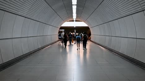 Walking-into-space,-Tottenham-Court-Road-Underground-Station,-London,-United-Kingdom