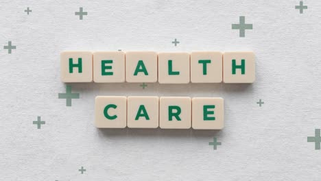 Scrabble-Tile-Showing-Health-Care-Cost-More-Affordable
