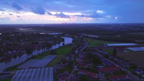 Amazing-colours-in-the-skies-above-the-city-of-Rotterdam,-Aerial-timelapse