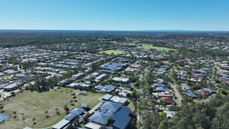 Drone-pull-away-tracking-shot-of-Narangba-Brisbane-Queensland-Suburb