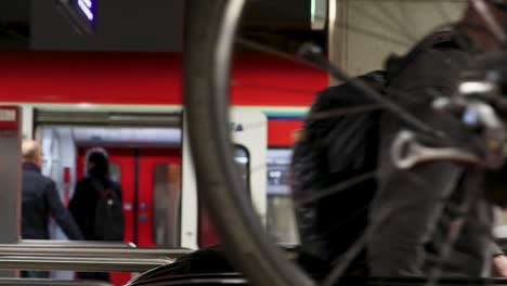 Passengers-using-escalator-and-entering-public-transport-subway-station,-Germany