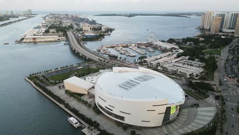 Miami-Downtown-beach-aerial-view-of-kaseya-center-main-avenue-highway-bridge-ocean-drive-traffic-road-drone-footage
