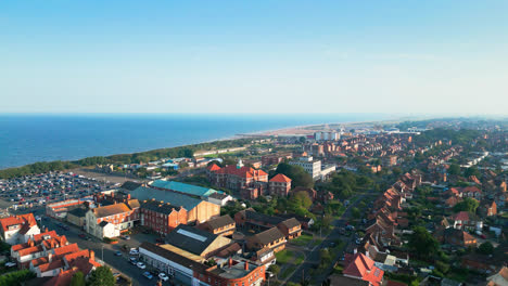 Dive-into-the-world-of-Skegness,-Lincolnshire,-with-this-mesmerizing-aerial-video,-capturing-its-bustling-town-and-beautiful-coastline