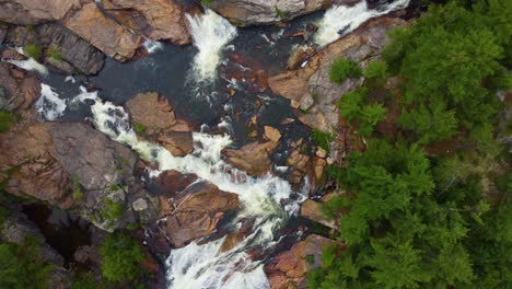 Duchesnay-Falls,-North-Bay-Ascending-overhead-aerial