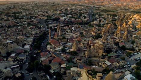 A-cinematic-journey-through-Cappadocia's-Goreme-at-night,-where-fairy-chimneys-and-ancient-caves-are-bathed-in-the-soft-glow-of-moonlight