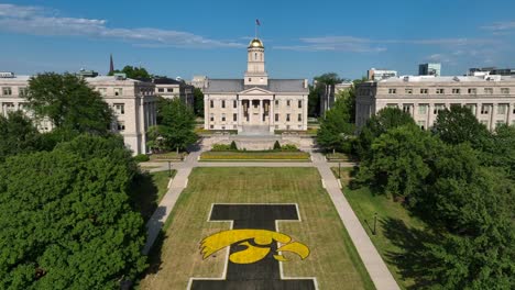 University-of-Iowa-Hawkeyes-logo-on-lawn-of-Old-Capitol-Building-of-IA