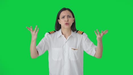 Angry-Indian-woman-pilot-shouting-on-someone-Green-screen