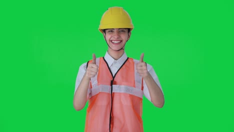 Happy-Indian-female-architect-doing-Thumbs-up-Green-screen
