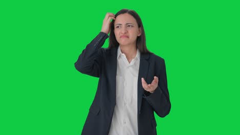 Confused-Indian-female-manager-thinking-about-something-Green-screen