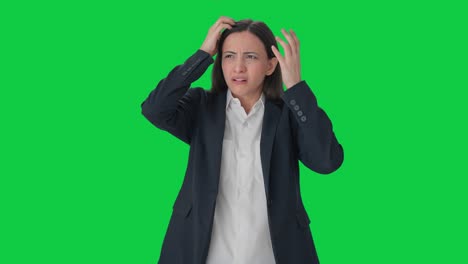 Stressed-and-tensed-Indian-female-manager-thinking-Green-screen