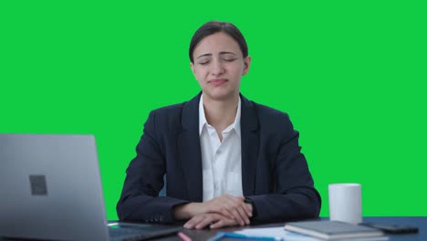 Upset-Indian-female-manager-slapping-her-head-Green-screen