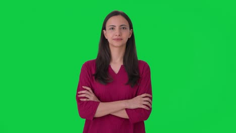 Happy-Indian-woman-standing-crossed-hands-Green-screen