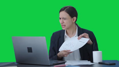 Angry-Indian-female-manager-shouting-on-video-call-Green-screen