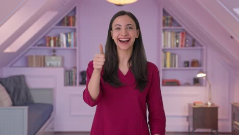 Happy-Indian-woman-showing-thumbs-up