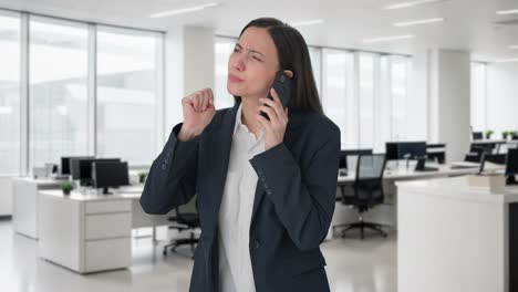 Angry-Indian-female-manager-shouting-on-phone