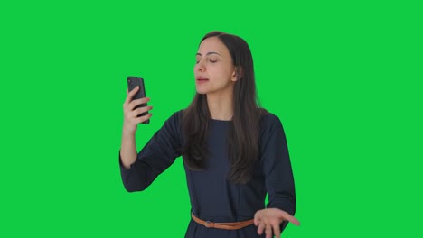 Angry-Indian-girl-shouting-on-video-call-Green-screen