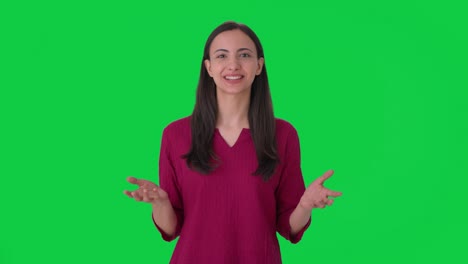 Happy-Indian-woman-talking-to-the-camera-Green-screen