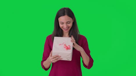 Happy-Indian-woman-receiving-a-gift-Green-screen