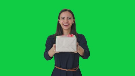 Happy-Indian-girl-giving-a-gift-Green-screen