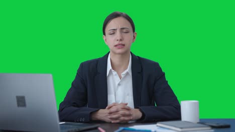 Indian-female-manager-talking-to-someone-Green-screen