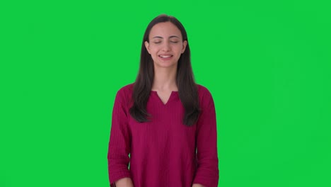 Happy-Indian-girl-relaxes-and-taking-long-breaths-Green-screen